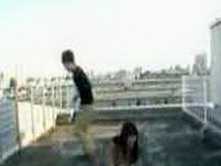 Dripping wet Oriental slut takes it from behind in Tokyo's urban jungle